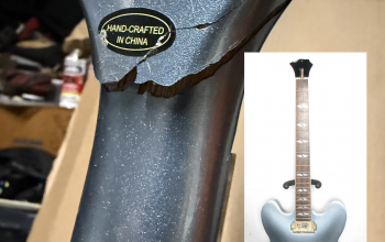 Close up of the headstock break of my Epiphone Dave Grohl signature guitar.
