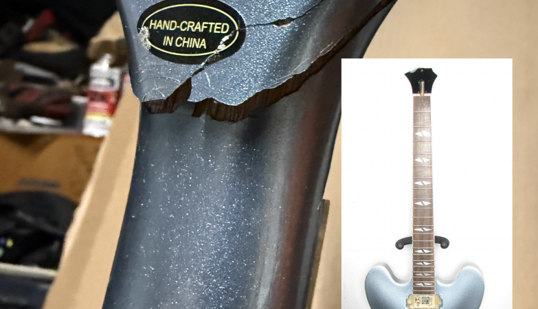 Close up of the headstock break of my Epiphone Dave Grohl signature guitar.